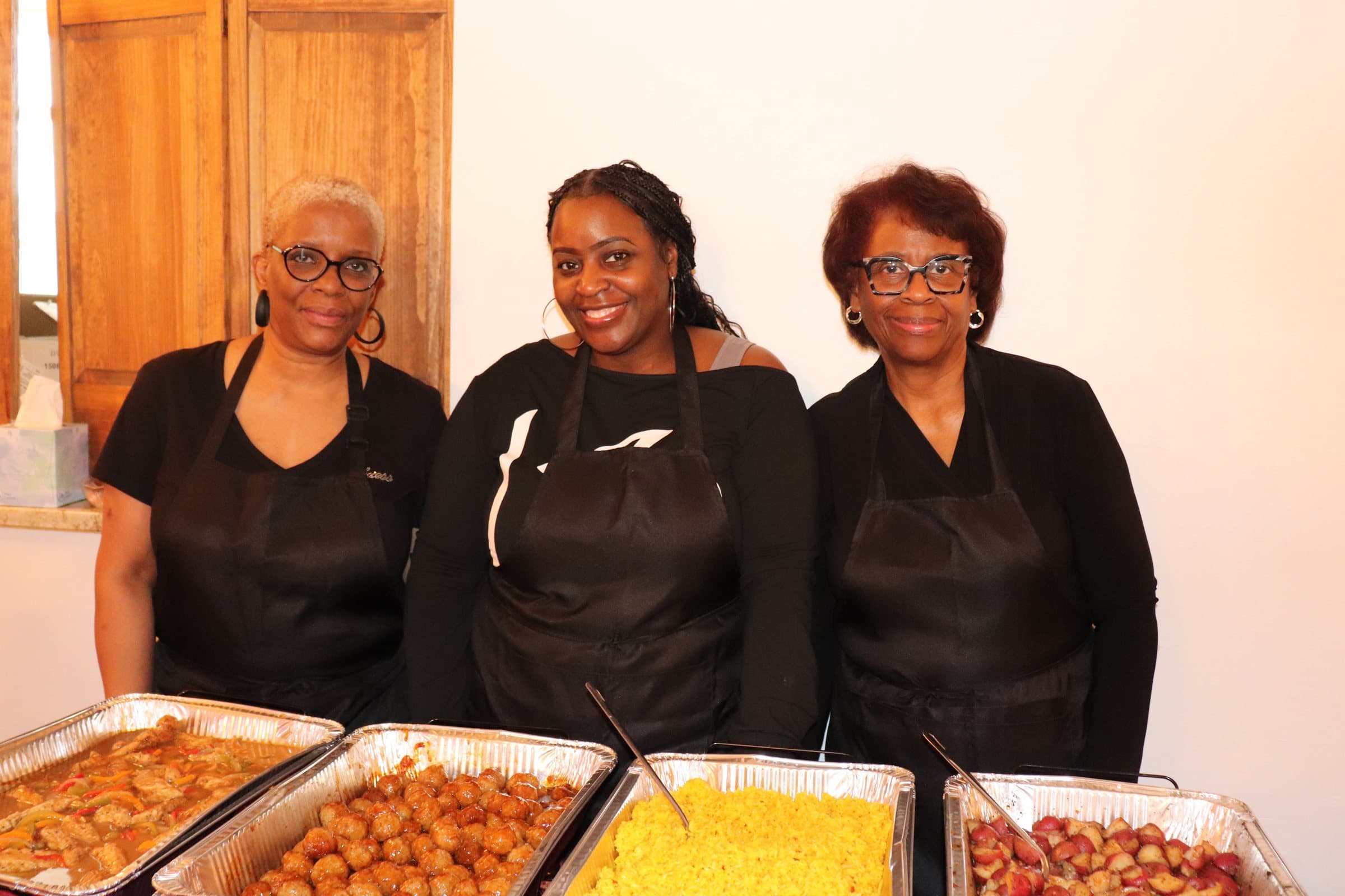 Community food table at A Date With Sis 2025